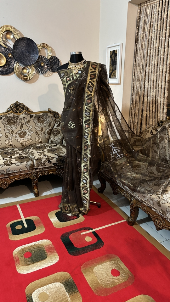 This is a Picture of a Dhakai Jamdani Saree. There are multiple designs woven in the Saree known as 'Motifs'.