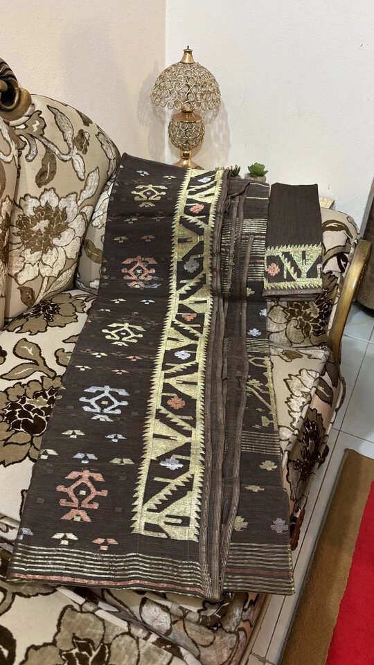 This is a picture of Dhakai Jamdani Saree. There are designs woven in this saree known as 'Motifs'.
