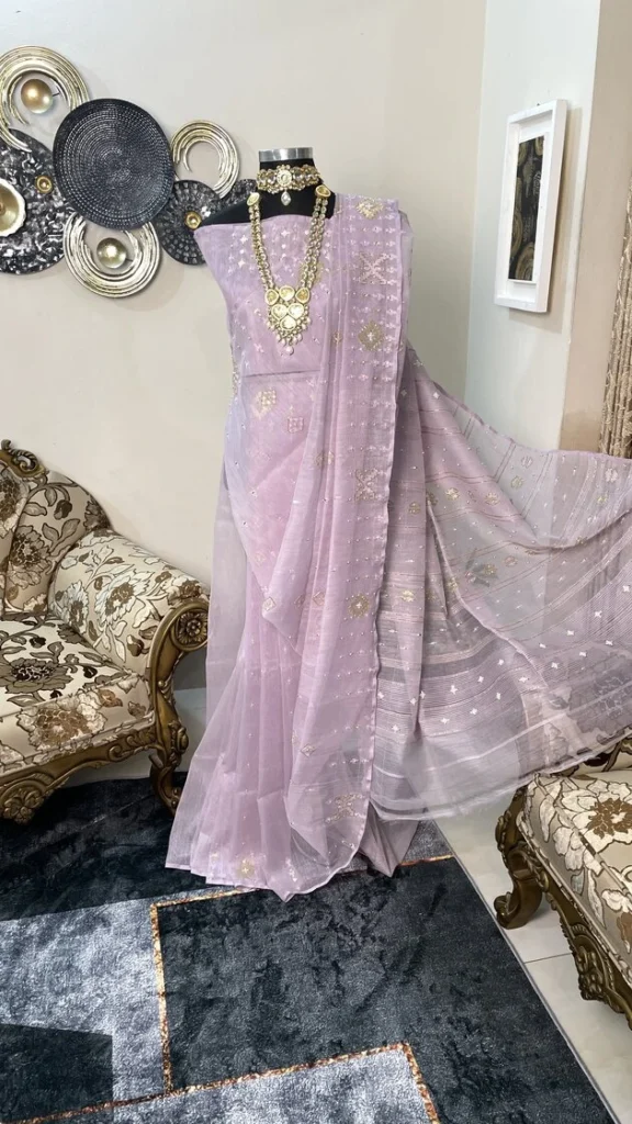 This is a Picture of a Dhakai Jamdani Saree. There are multiple designs woven in the Saree known as 'Motifs'.