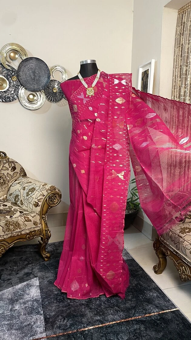 This is a Picture of a Dhakai Jamdani Saree. There are multiple designs woven in the Saree known as 'Motifs'.