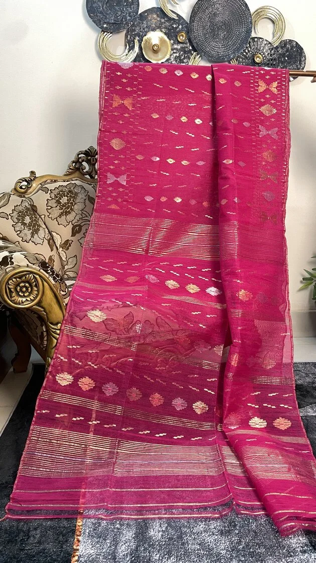 This is a Picture of a Dhakai Jamdani Saree. There are multiple designs woven in the Saree known as 'Motifs'.