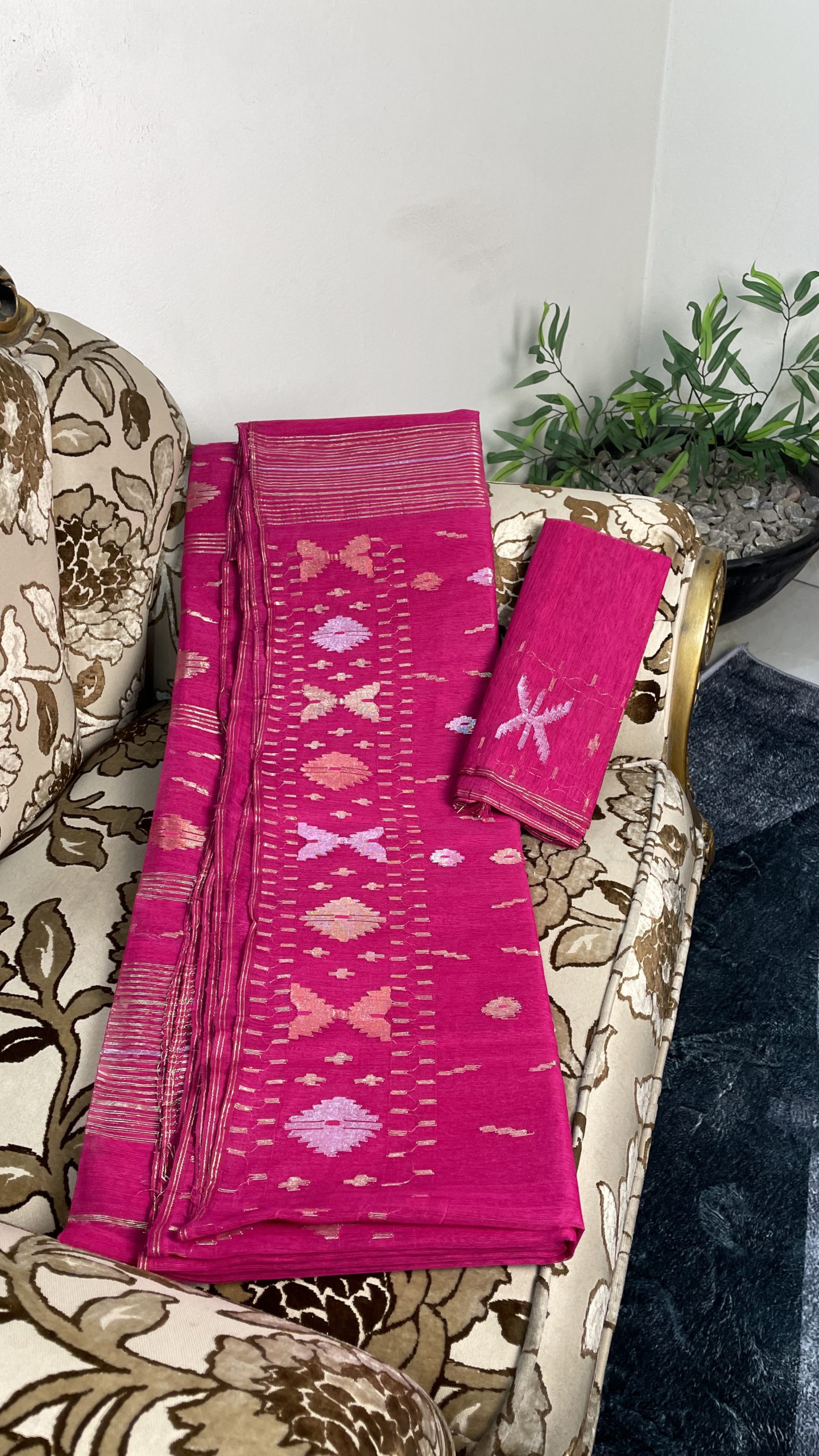 This is a Picture of a Dhakai Jamdani Saree. There are multiple designs woven in the Saree known as 'Motifs'.