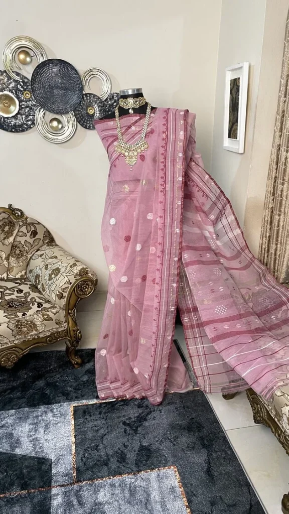 This is a Picture of a Dhakai Jamdani Saree. There are multiple designs woven in the Saree known as 'Motifs'.