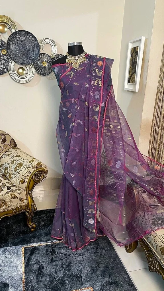 This is a Picture of a Dhakai Jamdani Saree. There are multiple designs woven in the Saree known as 'Motifs'.