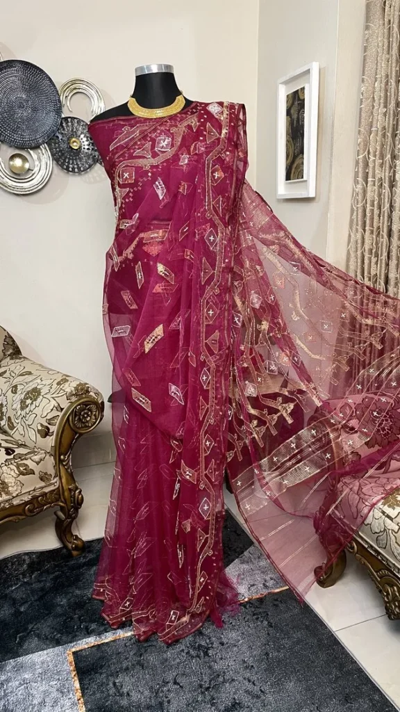 This is a Picture of a Dhakai Jamdani Saree. There are multiple designs woven in the Saree known as 'Motifs'.