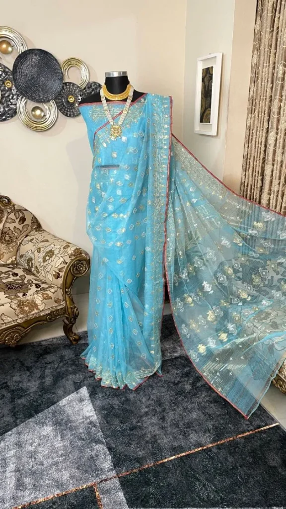 This is a Picture of a Dhakai Jamdani Saree. There are multiple designs woven in the Saree known as 'Motifs'.