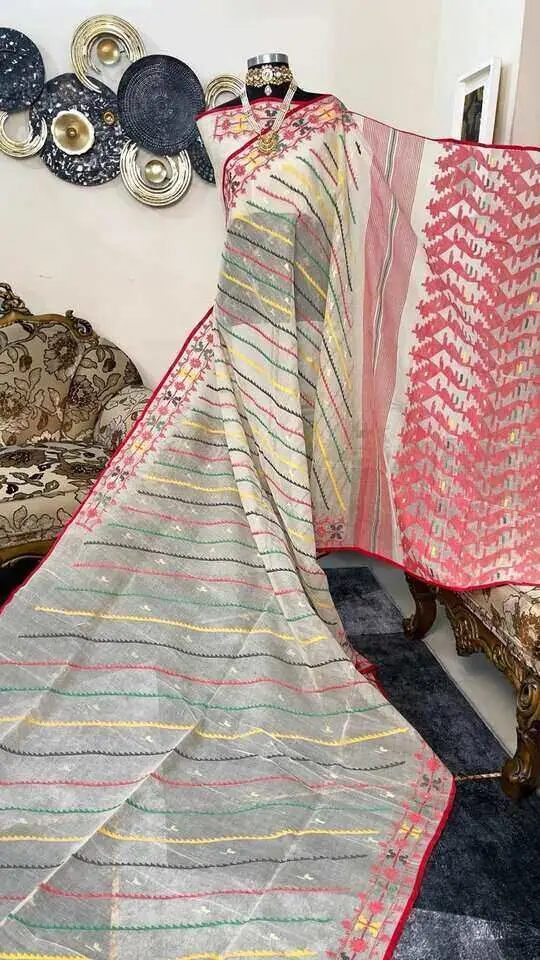 This is a Picture of a Dhakai Jamdani Saree. There are multiple designs woven in the Saree known as 'Motifs'.