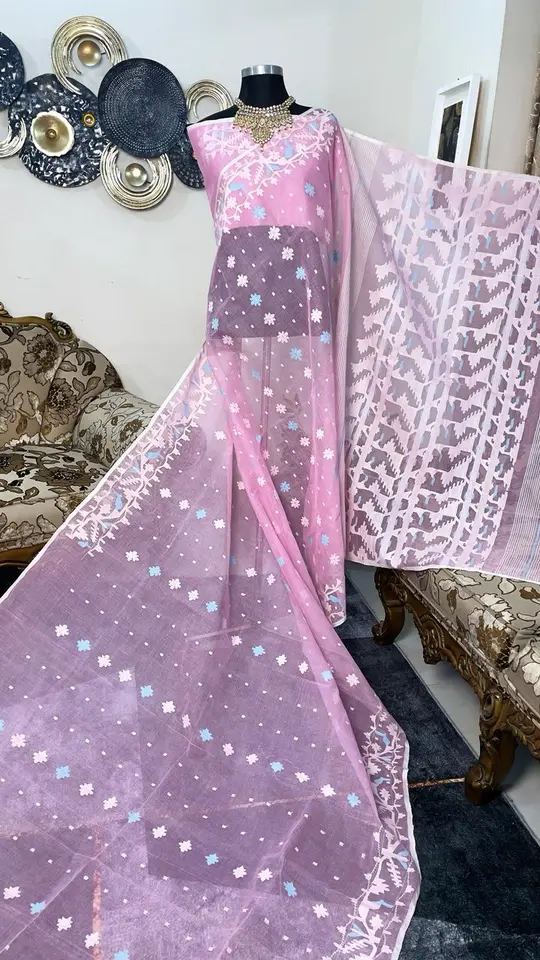 This is a Picture of a Dhakai Jamdani Saree. There are multiple designs woven in the Saree known as 'Motifs'.