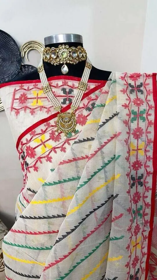 This is a Picture of a Dhakai Jamdani Saree. There are multiple designs woven in the Saree known as 'Motifs'.