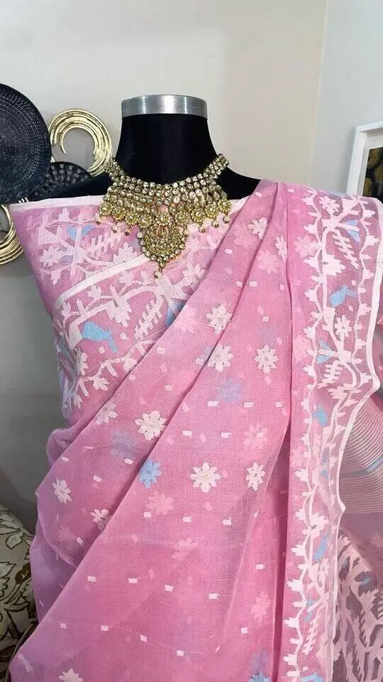 This is a Picture of a Dhakai Jamdani Saree. There are multiple designs woven in the Saree known as 'Motifs'.